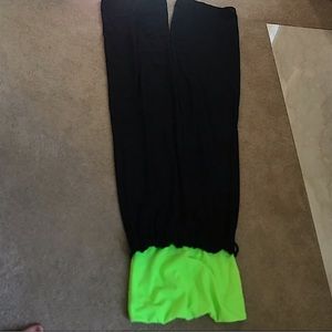 One piece fashion nova neon green and black dress up pant and sleeveless top